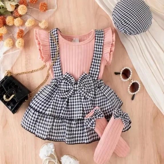 Baby girl houndstooth suspender skirt