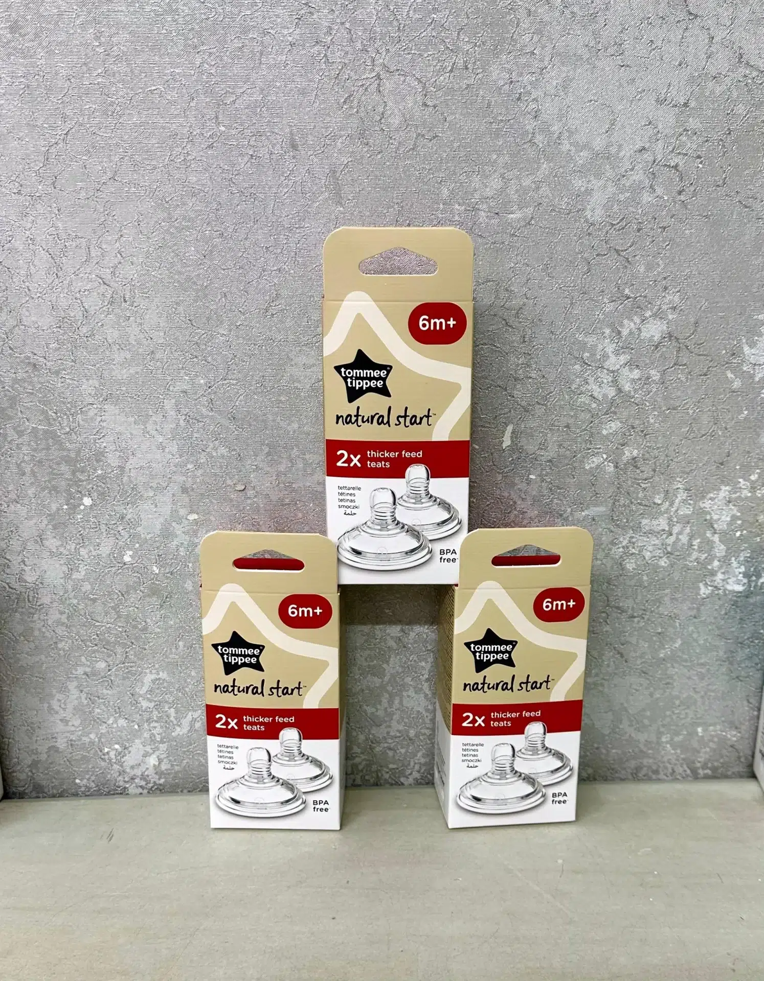 Tommie Tippee Natural Start Medium Flow Teats 2-pack for babies 3 months+, BPA-free silicone teats with anti-colic valve, displayed in retail packaging.
